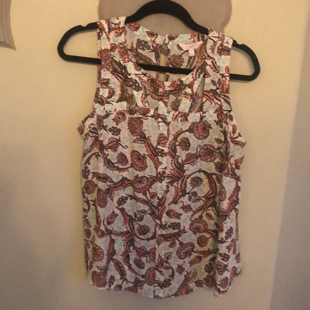 Multi color print blouse with neck cut out detail